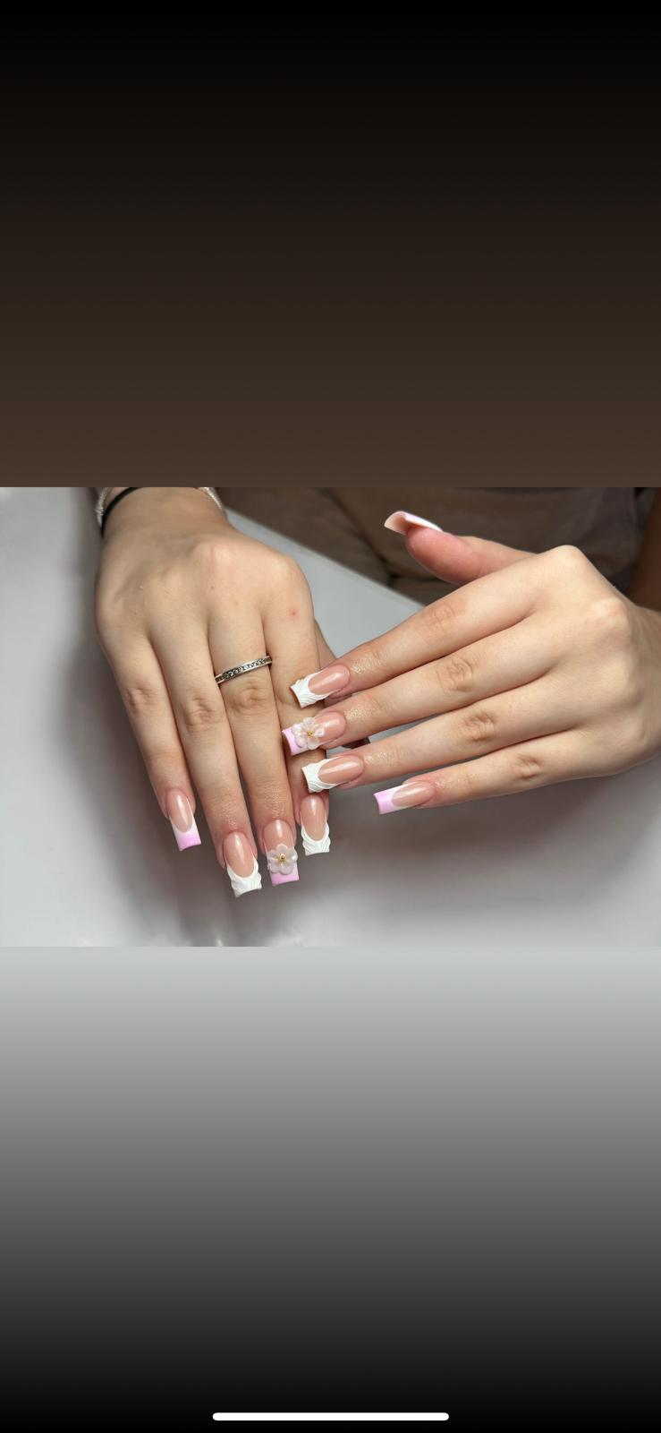 Pink and white French tips with floral details